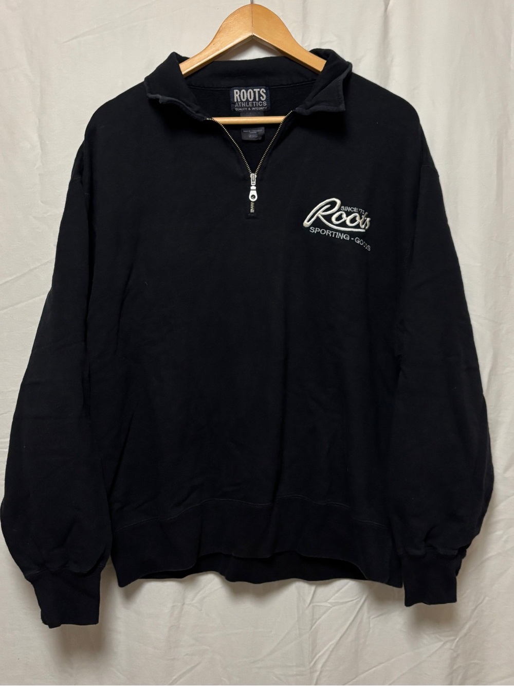 Vintage Roots black quarter zip sweater with embroidered logo